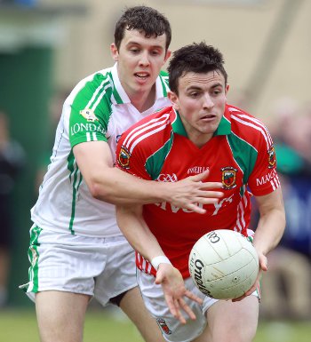 Mayo's Jason Dotherty with Alan Feeney of London in 2011 [Inpho]