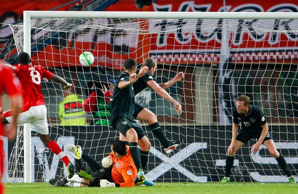 David Alaba of Austria scores past Irish goalkeeper David Forde