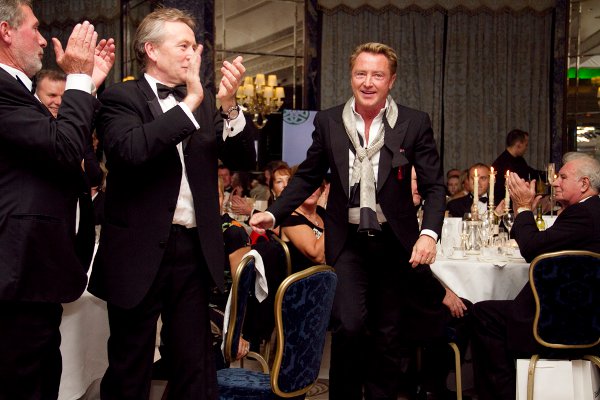 Michael Flatley gets up to accept his award