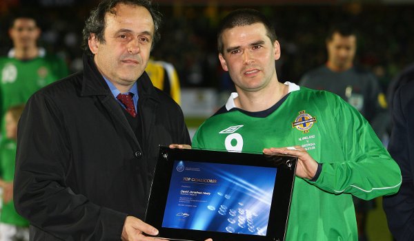 Uefa President Michel Platini presented Healy with an award for his record 13 goals in the 2008 European Championship qualifying campaign
