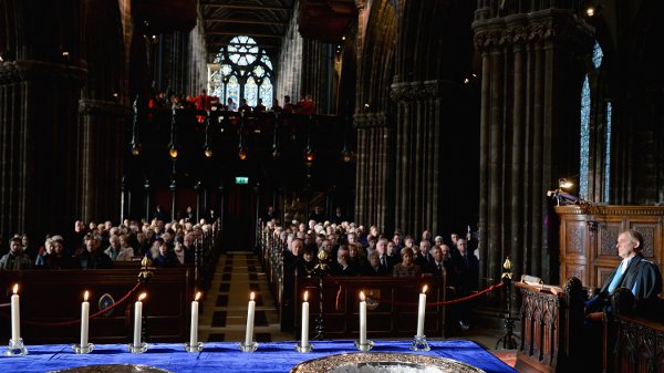 Mourners at a church in Glasgow