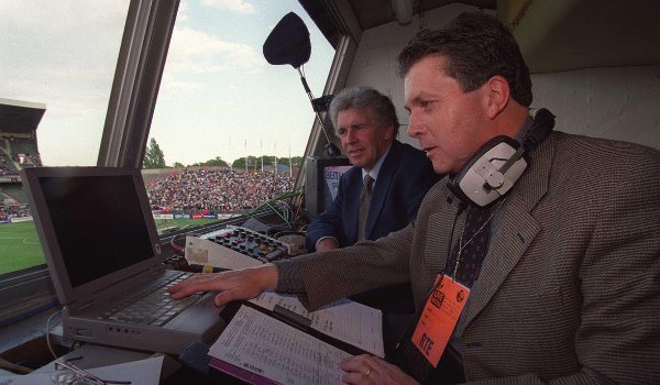 John Giles (left) enjoying one of his roles off the pitch, with George Hamilton, during an Ireland friendly against Scotland in 2000