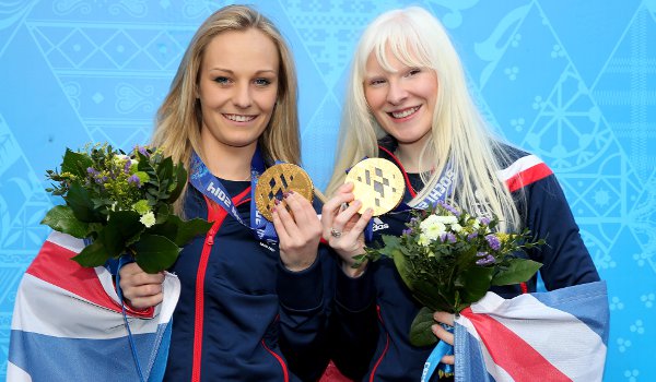 Kelly Gallagher (right) celebrating her gold medal win with guide Charlotte Evans