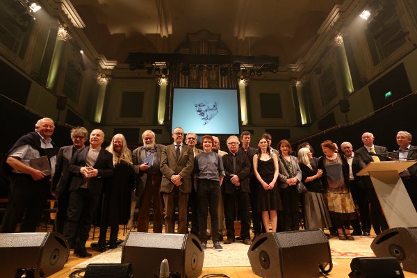 A family photo of all the acts who performed at last nights memorial concert