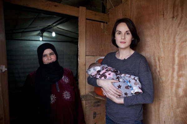 Michelle Dockery meets Um Firas who lives in a tent in  Jawa in the South East of Amman where many Syrian refugee families are living in tented settlements.