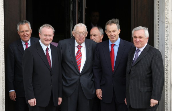 Northern Ireland First Minister Ian Paisley, and Deputy First Minister Martin McGuinness, with Prime Minister Tony Blair, Taoiseach and Fianna Fail leader Bertie Ahern, Northern Ireland Secretary Peter Hain, and Foreign Minister Dermot Ahern at Stormont after the opening of the new Northern Ireland Assembly and the election of an Executive in 2007. (Photo: Eamonn Farrell/Photocall Ireland)