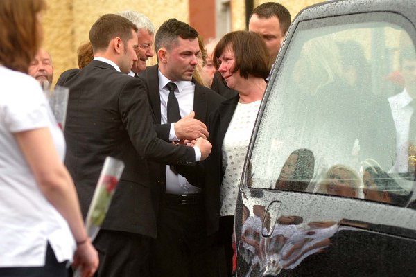 Karen Buckley's heartbroken family at her funeral service yesterday. Picture: Des Barry