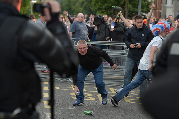 Police record events during disturbances at the Ardoyne interface (Getty Images)