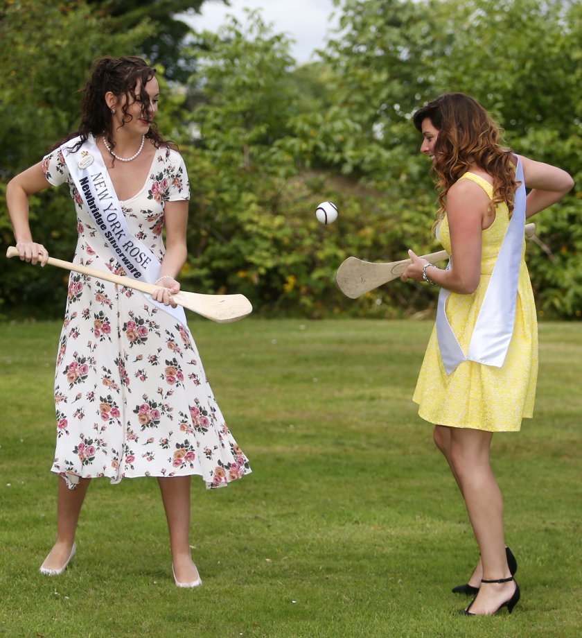 11/08/2015. Rose of Tralee 2015. Pictured (LtoR) Newyork Rose Sophie Colgan and Scotland Rose Brid Madigan play some hurling as the 2015 Roses are unvailed ahead of the International Rose of Tralee Festival 2015 from the 14th to 18th August 2015 in RTE studios in Dublin this morning. Photo: sam Boal/Rollingnews.ie