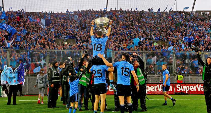 Alan Brogan raises the Sam Maguire in front of Hill 16 [Picture: Inpho]