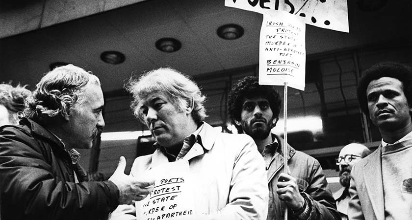 Irish Poet Seamus Heaney(3rd R) with Dunnes Stores Workers at a anti apartheid demo. 19/10/1985 Photo: Eamonn Farrell/RollingNews.ie