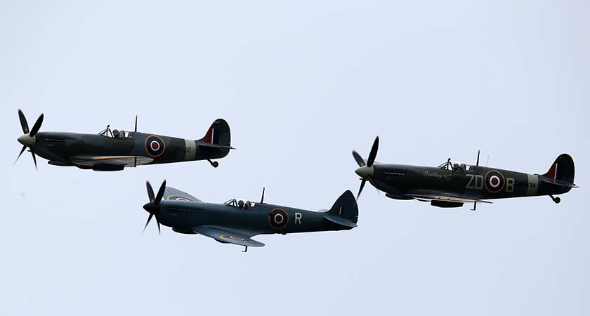 Spitfires and Hurricanes perform a fly past in Biggin Hill, England. (Photo by Carl Court/Getty Images)