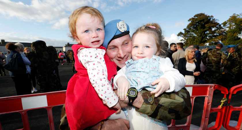 07/10/2015. Irish Troops Return Home. Pictured is Eugene McDaid and his daughters Lily age2 and Mya age1 from Strabane as Irish Troops as Return Home to Baldonnell Airport After Completing Six Month Deployment to the Golan Heights. Photo: RollingNews.ie