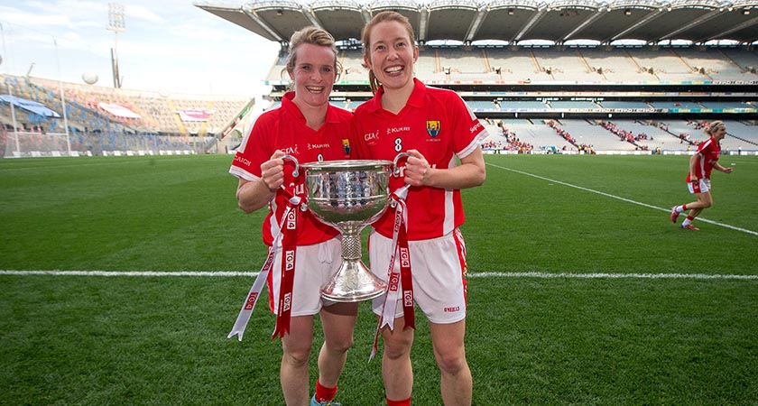 2014 TG4 All Ireland Ladies Senior Football Championship Final, Croke Park, Dublin 27/9/2015 Cork vs Dublin Cork's Briege Corkery and Rena Buckley celebrate with the Brendan Martin Cup Mandatory Credit ©INPHO/Ryan Byrne