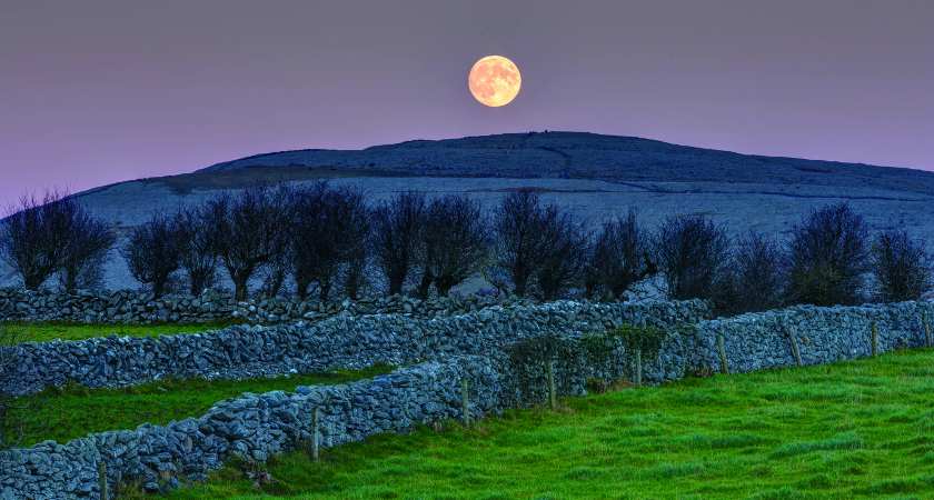 Full moon rising over Abbey Hill. taken from This is the Burren by Carsten Krieger, published by The Collins Press, 2015