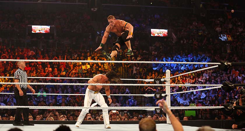 NEW YORK, NY - AUGUST 23:  Seth Rollins and John Cena battle it out at the WWE SummerSlam 2015 at Barclays Center of Brooklyn on August 23, 2015 in New York City.  (Photo by JP Yim/Getty Images)