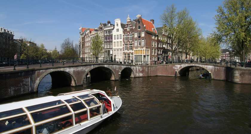 Tour boat in an Amsterdam canal