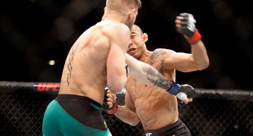 DECEMBER: Conor McGregor knocks out Jose Aldo to claim the UFC featherweight title inside 13 seconds