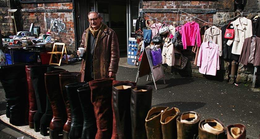 GLASGOW, SCOTLAND - APRIL 8:  A trader works at Glasgow's 200-year-old Paddy's Market on April 8, 2009 in Glasgow, Scotland. The market in Shipbank Lane is set to close after Glasgow City Council announced its intention to buy the site from Network Rail with plans to regenerate the area.  (Photo by Jeff J Mitchell/Getty Images)
