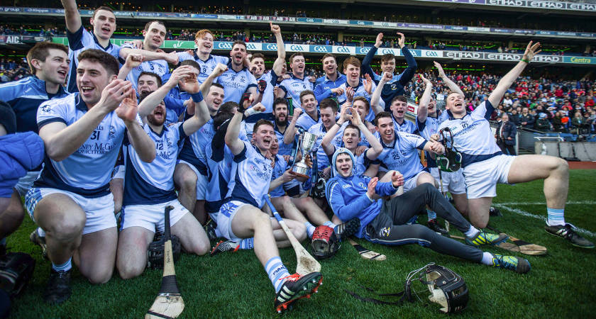 Na Piarsaigh players celebrate with the cup after beating Cushendall 2-25 to 2-14 [Mandatory Credit ©INPHO/Cathal Noonan]