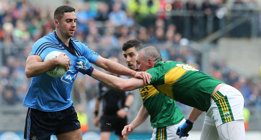 Dublin's James McCarthy and Kieran Donaghy of Kerry in the NFL final [©INPHO/Lorraine O'Sullivan]