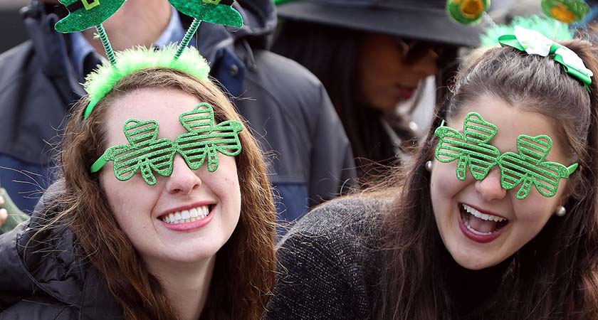 Smiles are seen on the faces of spectators as The St Patrick's day parade makes its way along O'Connell Street, as the largest St Patrick's day celebrations in Ireland makes its way through Dublin city centre on March 17, 2016. / AFP / PAUL FAITH (Photo credit should read PAUL FAITH/AFP/Getty Images)