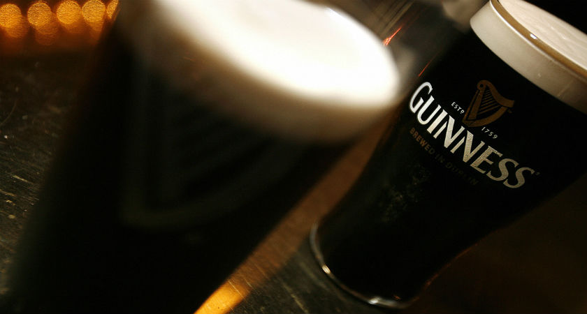 Pints of Guinness beer are pictured in London. (Getty)