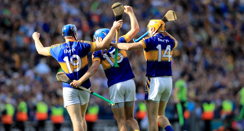 John McGrath, Seamus Callanan and Jason Forde of Tipperary celebrate at the final whistle ©INPHO/Donall Farmer
