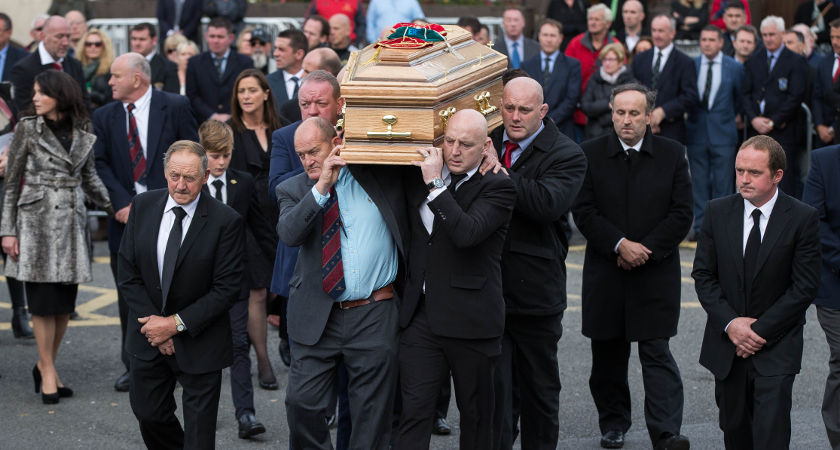 Mick Galway, Peter Clohessy, Keith Wood and John Hayes carry The coffin [©INPHO/Ryan Byrne]