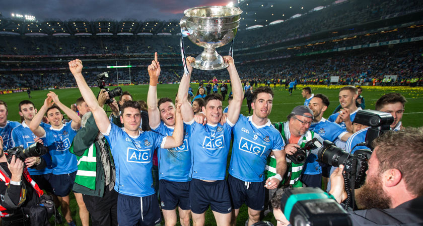 Bernard Brogan, Kevin McManamon, Diarmuid Connolly and Michael Darragh Macauley celebrate with the Sam Maguire cup after the match [©INPHO/Cathal Noonan]