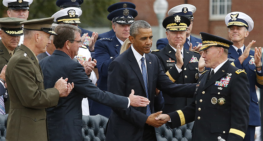 (L-R) Incoming Chairman of the Joint Chiefs of Staff, Marine Corps Gen. Joseph Dunford; Secretary of Defense Ash Carter and US President Barack Obama greet outgoing Chairman of the Joint Chiefs of Staff Gen. Martin Dempsey (R) during his retirement ceremony at Fort Myer, Virginia on September 25, 2015. AFP PHOTO/YURI GRIPAS (Photo credit should read YURI GRIPAS/AFP/Getty Images)