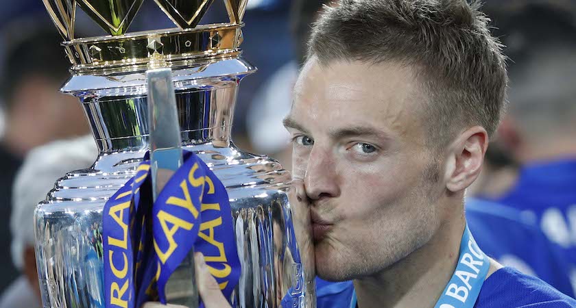 Leicester City's English striker Jamie Vardy kisses the Premier league trophy after winning the league and the English Premier League football match between Leicester City and Everton at King Power Stadium in Leicester, central England on May 7, 2016. / AFP / ADRIAN DENNIS / RESTRICTED TO EDITORIAL USE. No use with unauthorized audio, video, data, fixture lists, club/league logos or 'live' services. Online in-match use limited to 75 images, no video emulation. No use in betting, games or single club/league/player publications. / (Photo credit should read ADRIAN DENNIS/AFP/Getty Images)