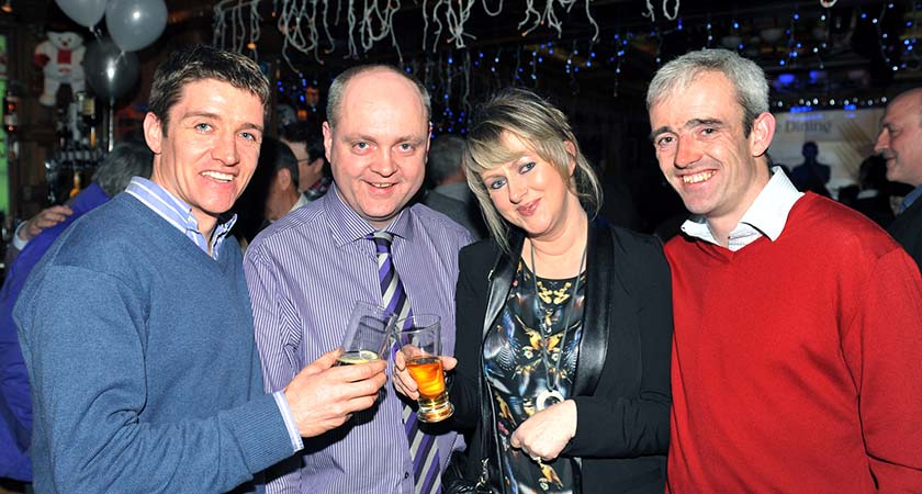 Finbar Holian and his wife Geraldine are pictured with jockeys Barry Geraghty and Ruby Walsh in 2011. Photo - Malcolm McNally