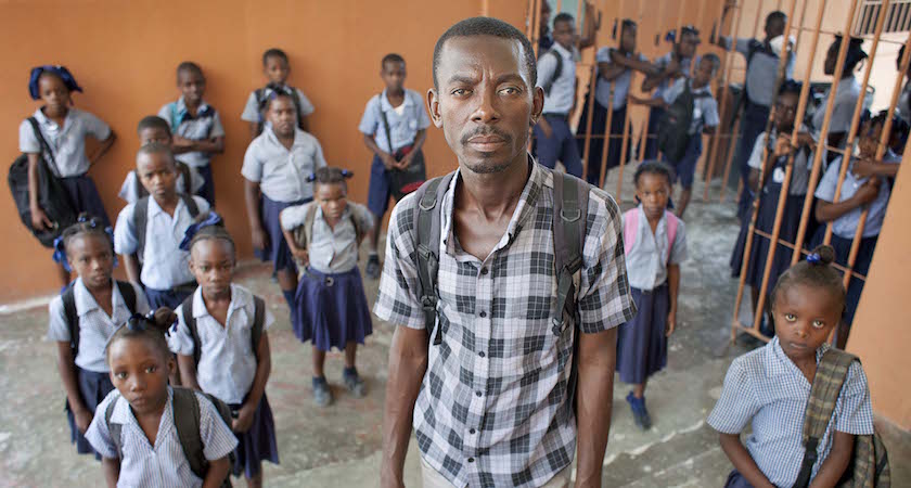 Lucknord Dorvilson, Community Facilitator, in a school in Grand Ravine where he helped to ensure new hand washing and toilets were installed. Photographer: Abbie Trayler-Smith/April 2016/Haiti/Panos Pictures for Concern Worldwide