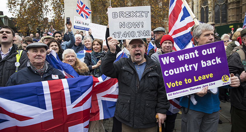 LONDON, ENGLAND - NOVEMBER 23: Pro-Brexit demonstrators protest outside the Houses of Parliament on November 23, 2016 in London, England. British Prime Minister Theresa May has said that she will not delay triggering article 50, the formal process of leaving the European Union, but wants to avoid a "cliff edge". (Photo by Jack Taylor/Getty Images)