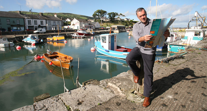 James Ruddy mulls over the route in lovely Carnlough on the Causeway Coastal Route