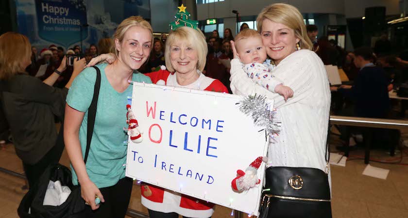 22/12/2016 People coming home for Christmas at Dublin Airport. Pictured are Iris Brennan(red) and Kirstin O'Reilly (white) as the greet Sandra O'Reilly (green) and her 6 months old baby Ollie Polo arriving from Austaralia as many people coming home for Christmas at Dublin Airport. Photo: RollingNews.ie