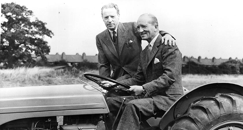 Sir John Black of the Standard Motor Co at the wheel of a new Ferguson farm tractor, beside inventor Harry Ferguson. (Picture: J. A. Hampton/Topical Press Agency/Getty Images)
