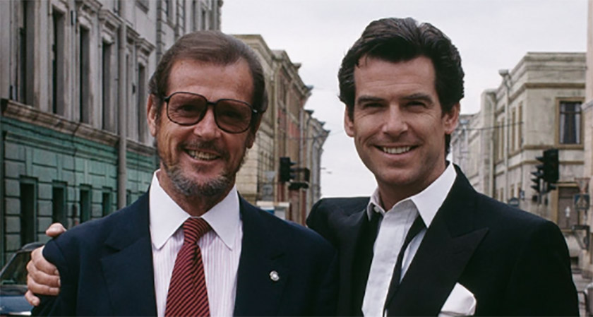 Sir Roger Moore and Pierce Brosnan together in 1995 at the premiere of GoldenEye.