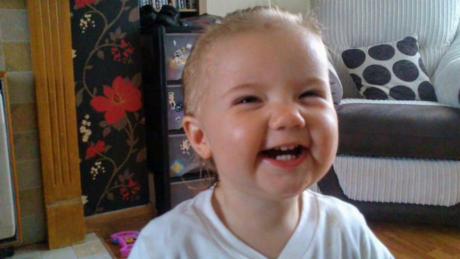 Mother of two-year-old who died in 2013 makes emotional appeal for stolen lock of hair.