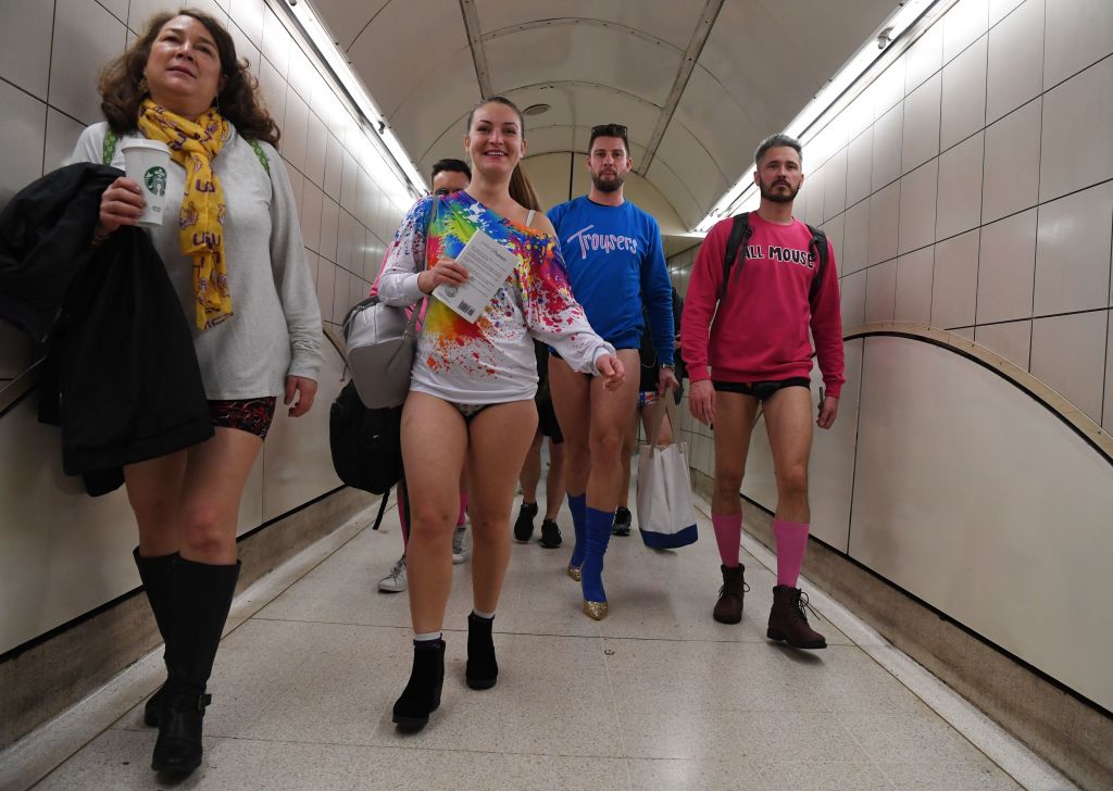 Travellers cast off inhibitions on no pants subway ride day – in pictures |  London | The Guardian