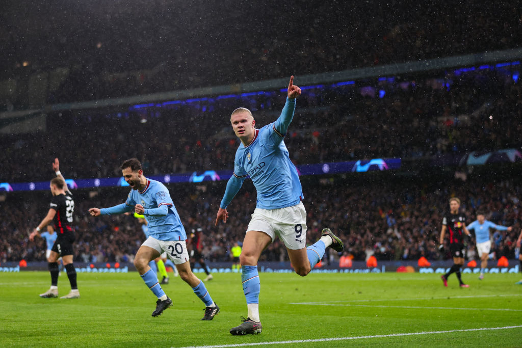 MANCHESTER, ENGLAND - MARCH 14: Erling Haaland of Manchester City celebrates scoring his 2nd goal during the UEFA Champions League  (Photo by Marc Atkins/Getty Images)